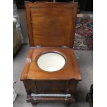 A Victorian mahogany commode.