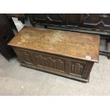 A small oak linen fold blanket box.