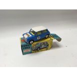 A collection of toys including a boxed Corgi mini