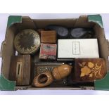 A collection of wooden boxes and other oddments.