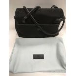 An as new black Radley handbag with dust bag.