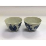 A pair of blue and white tea bowls depicting Samur