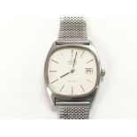 A gents Omega De Ville watch with white dial and b