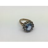 A 9ct gold ring set with blue stones, approx 4.6g