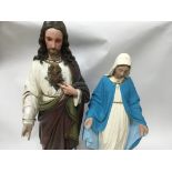 Two plaster figures in the form of the Virgin Mary