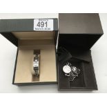 2 boxed ladies Gucci wristwatches