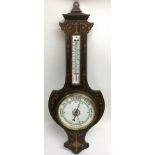 An inlaid aneroid barometer, approx 87cm