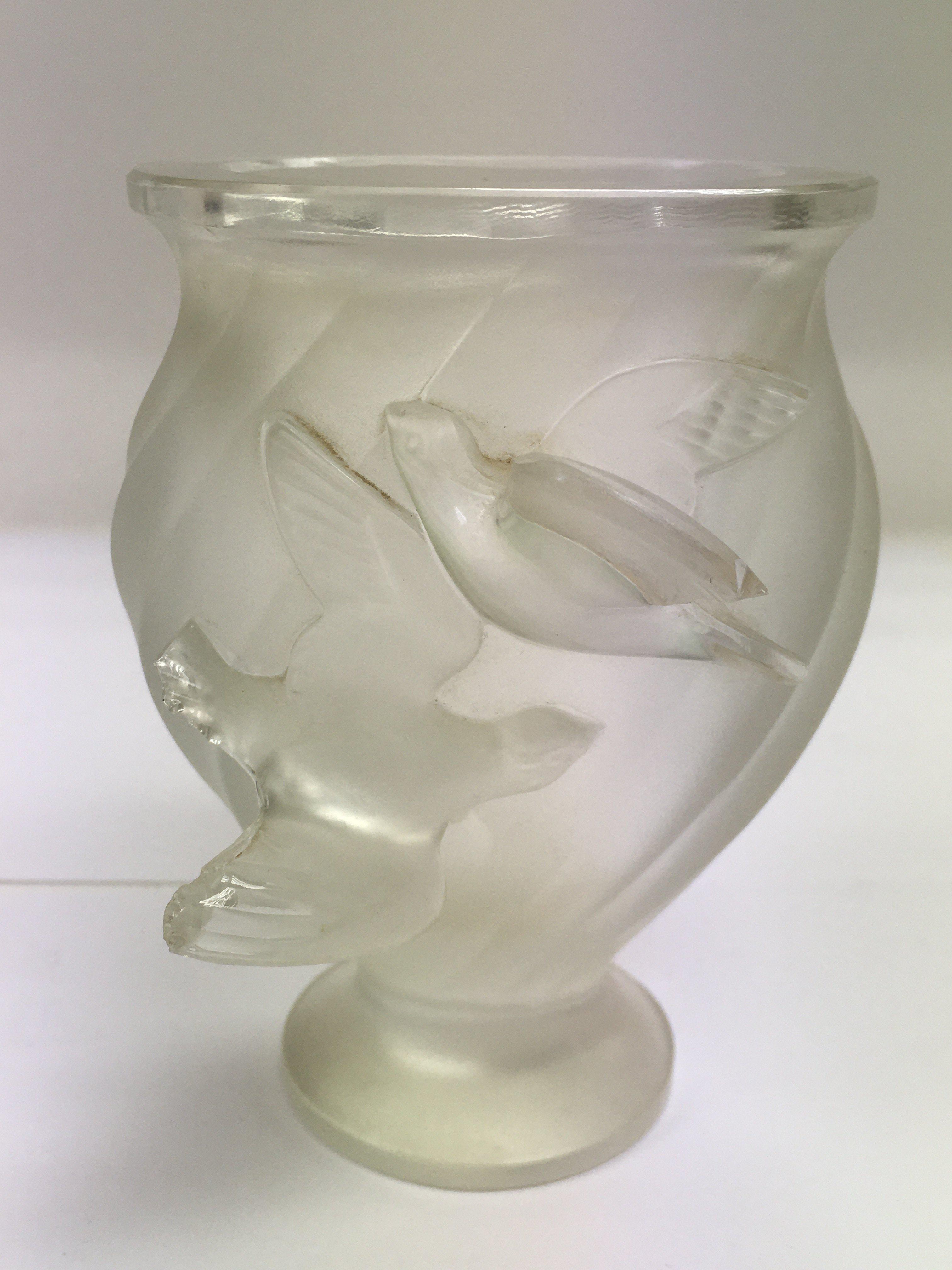 A Lalique dove vase, some damage, approx height 12