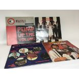 Four Vintage records a signed Chas & Dave Well Pleased album James Bond Collection pump up the