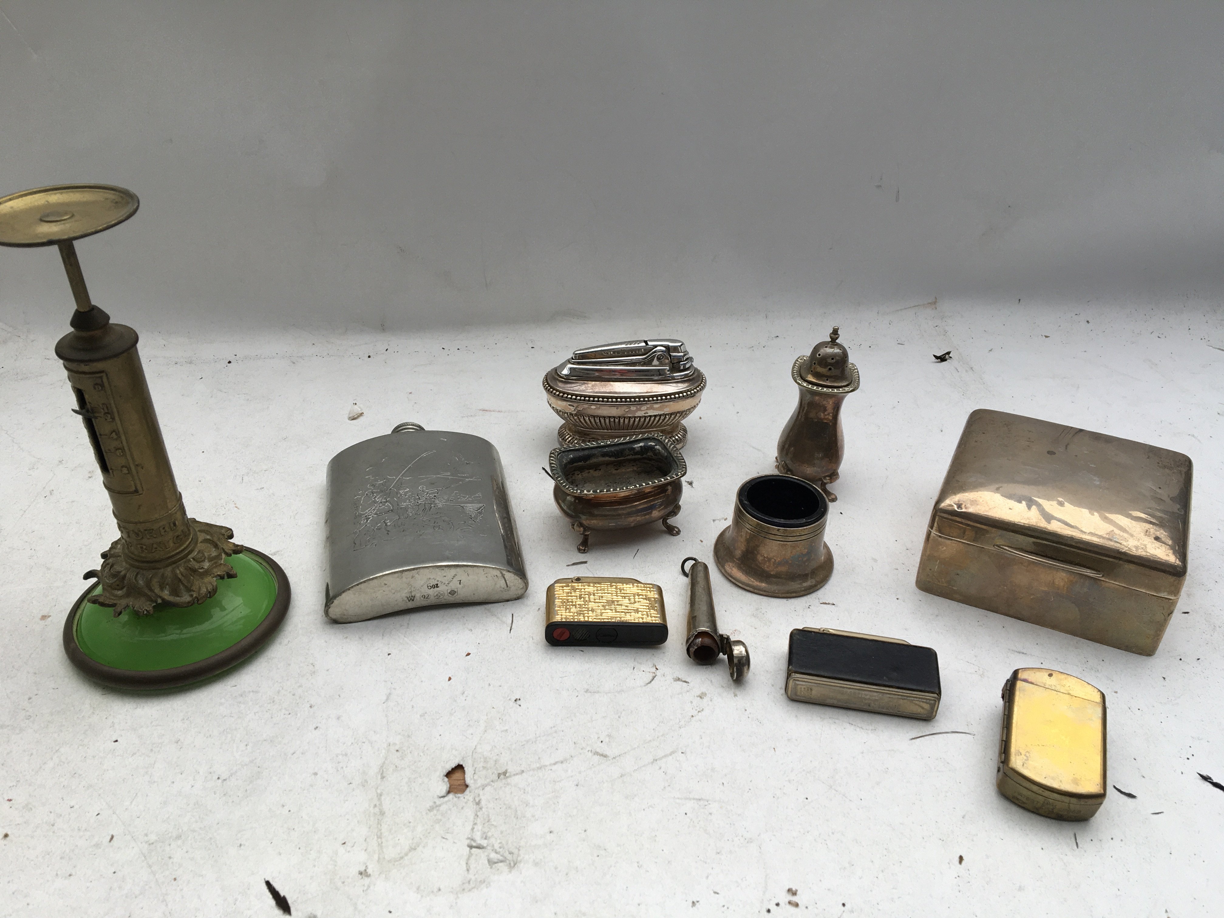 A collection of various items including a stamped