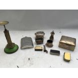 A collection of various items including a stamped