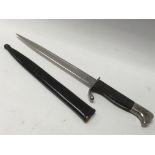 A 1897 letter opener in the form of a bayonet
