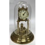 A brass domed doc pendulum anniversary clock,