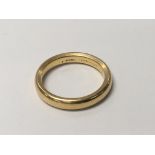 A 22carat gold wedding ring weight 6.5g