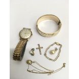 A rolled gold bangle, Talin watch and yellow metal odds