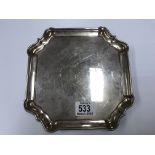 A heavy hallmarked silver card tray approximately