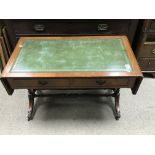 A leather topped 2 drawer folding sofa table.