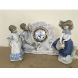 A Lladro porcelain clock figurine and 2 additional