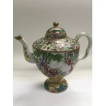 A Canton teapot with handpainted decoration of fig