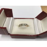 An 18ct 4 stone diamond set ring.