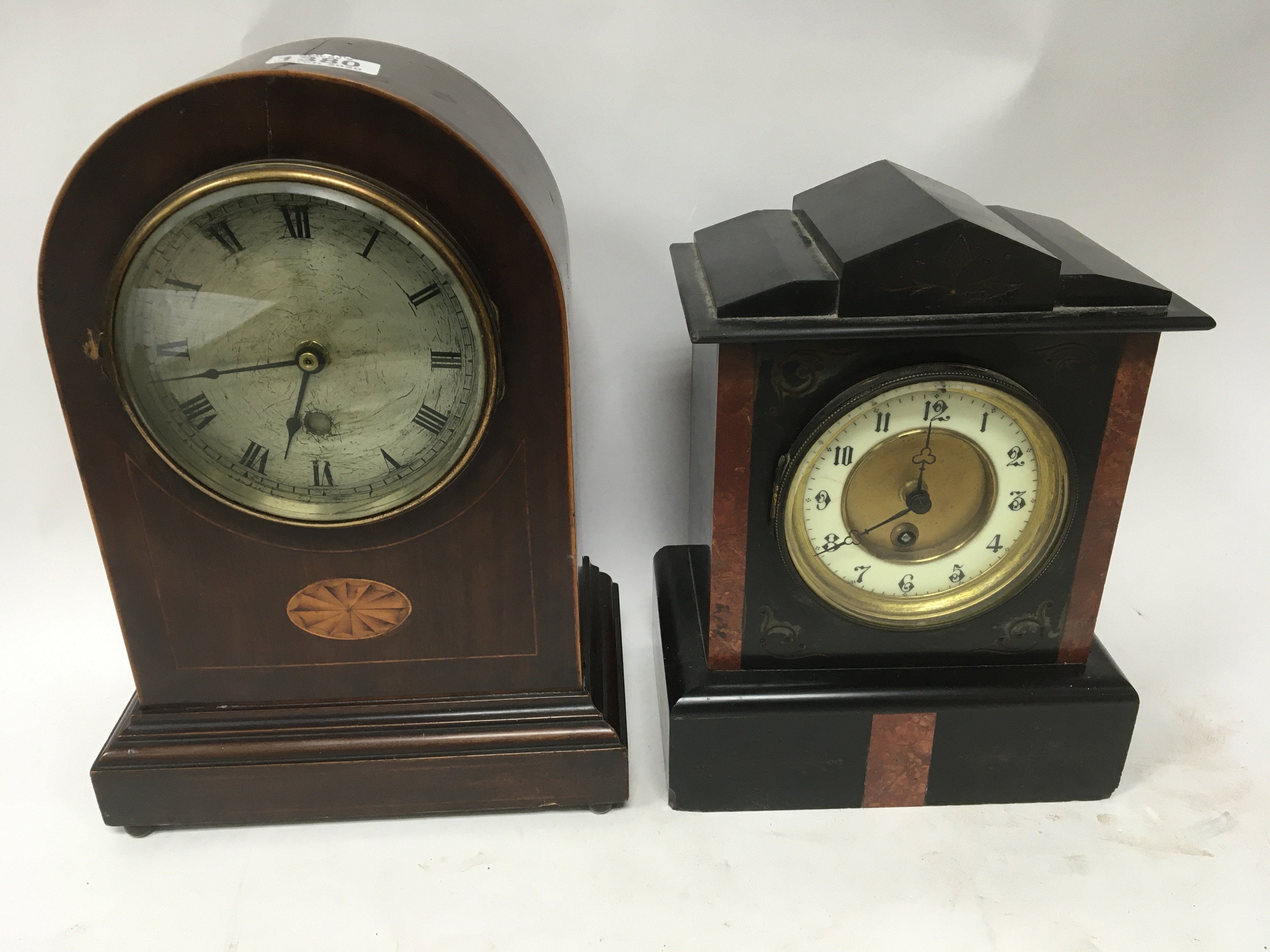 An Edwardian inlaid mantle clock and additional Victorian black slate mantle clock.