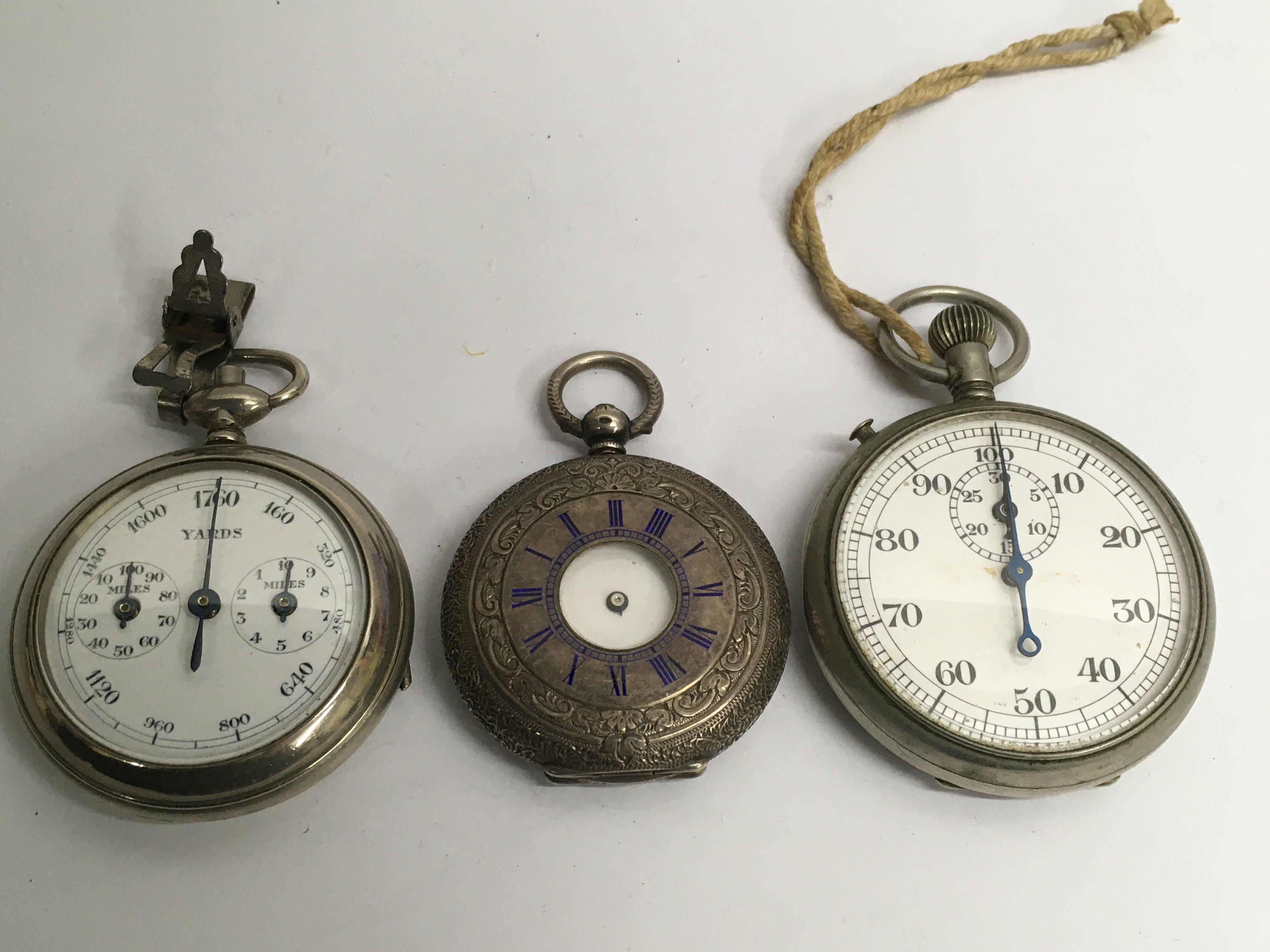 A silver, half hunter pocket watch, a/f, a stopwat