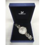 A boxed Swarovski ladies watch with silvered dial