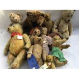 A collection of well loved , playworn Teddy bears