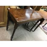 A 1920 mahogany folding topped card table.