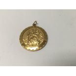 A 9 ct gold pendant 15 grams approx