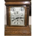 A oak cased mantle clock with musical movement str