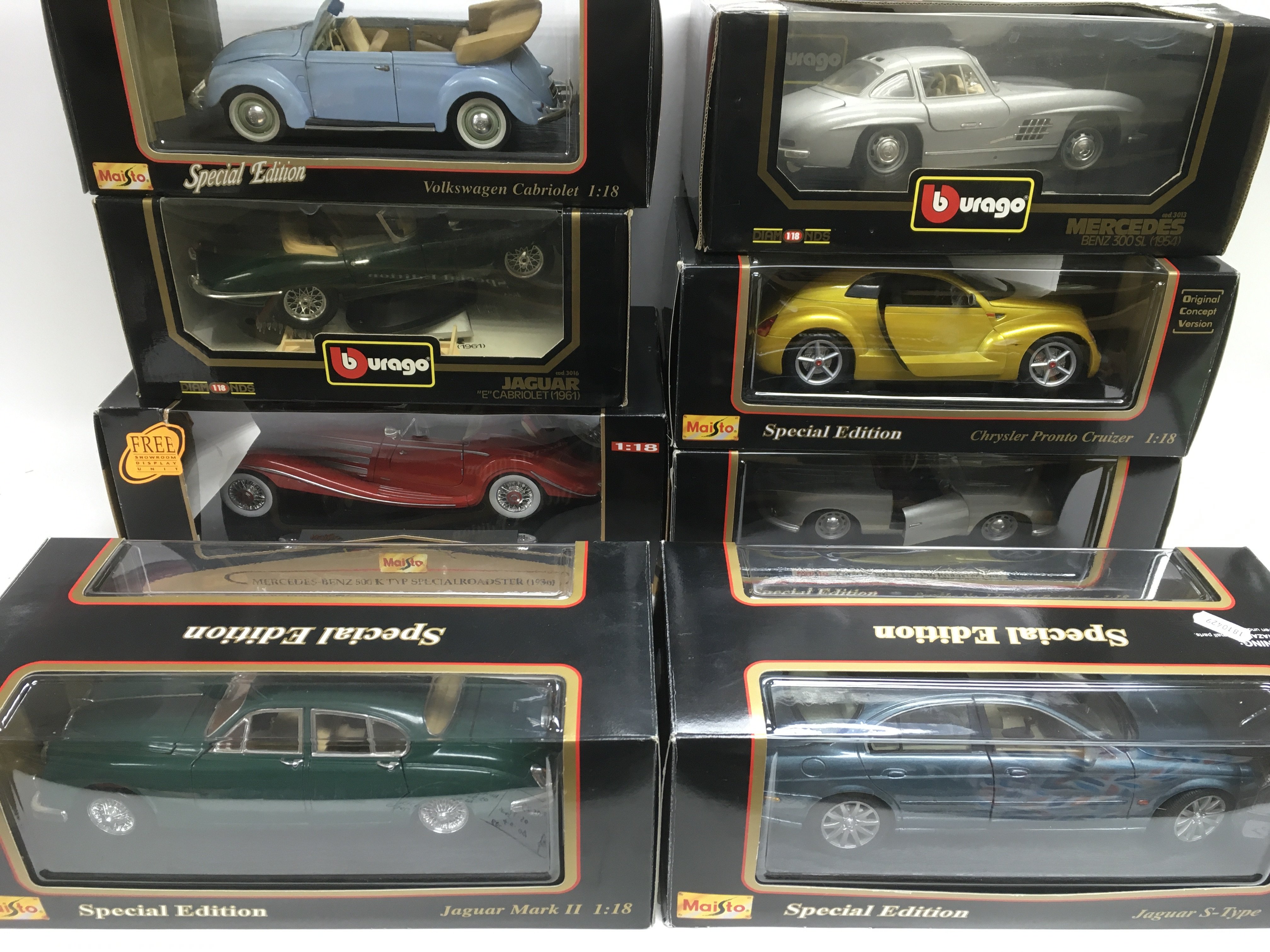 Fourteen boxed 1:18 scale die cast cars, mostly Bu