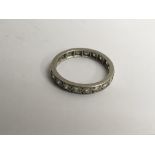A white gold and diamond eternity ring, approx O