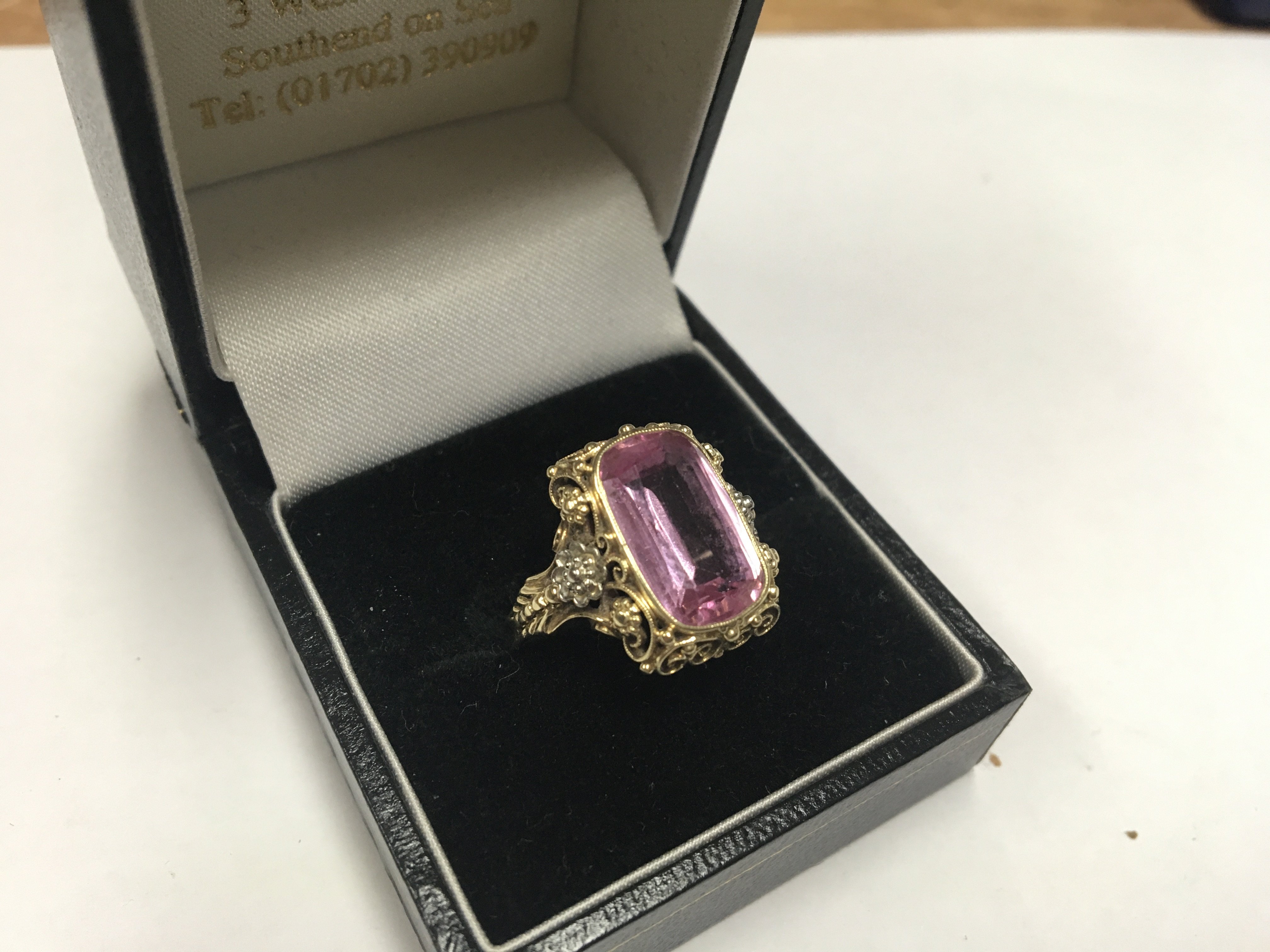 A fancy 18ct yellow gold ring with a pink tourmali