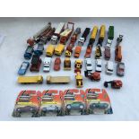 A collection of loose die cast vehicles including,