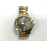 A Gucci gents watch with bi metal strap and gold t