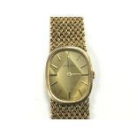 A gold Beuche Girod watch, approx