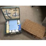 A vintage Brexton picnic hamper and a wicker examp