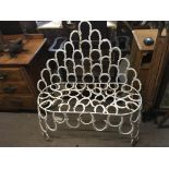 A white painted horseshoe garden bench.w101cm