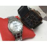 One ladies and one gents Fossil watches boxed