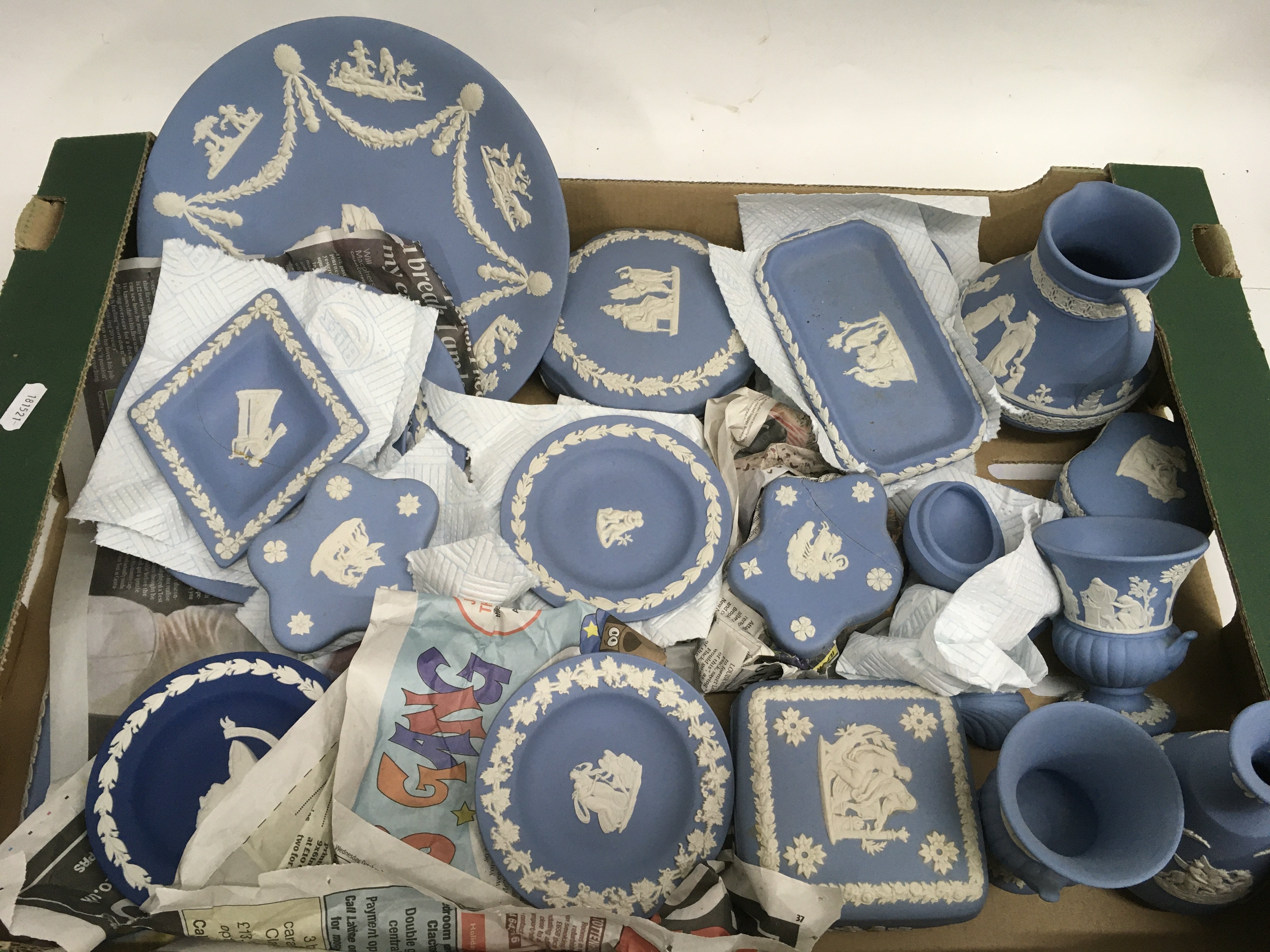 A box containing Wedgwood blue Jasperware