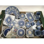A box containing Wedgwood blue Jasperware