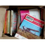 A box containing Military history books and magazi