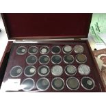 Three collectors cases containing coinage various silver and proof.