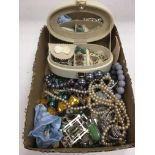 A box of costume jewellery including a jadeite nec