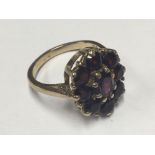 A 9ct gold and garnet set ring