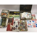 A collection of trading cards, tea cards and postc