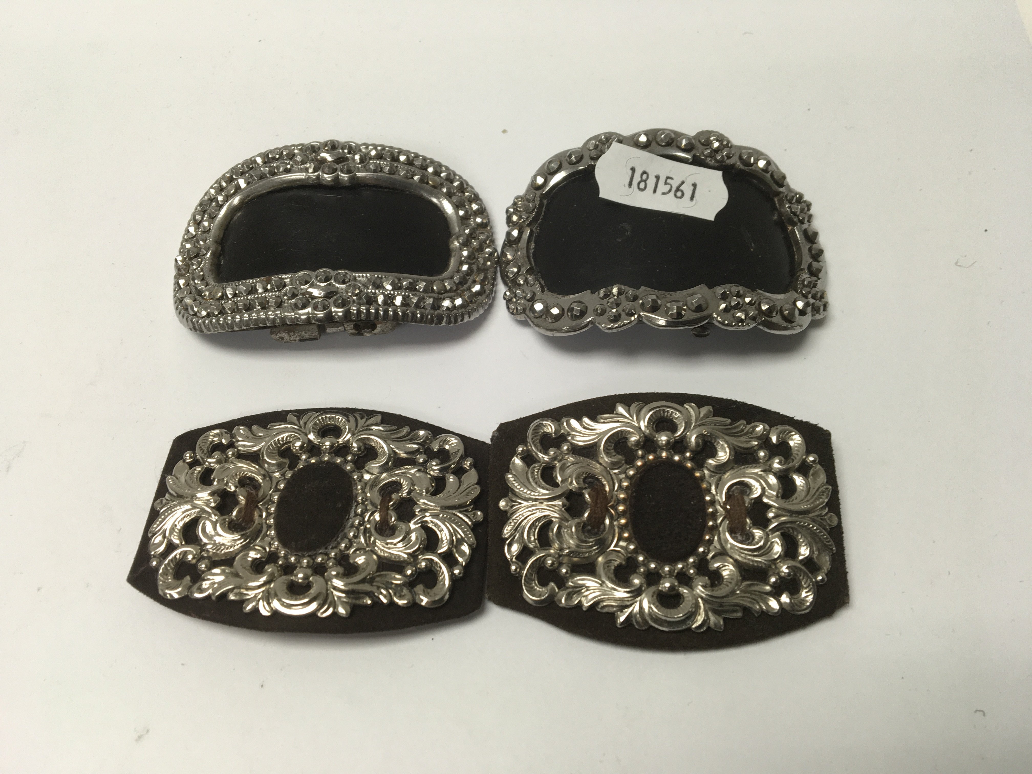 A pair of French white metal shoe buckles and two