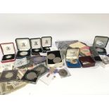 A collection of mint silver proof commemorative co