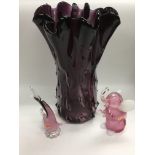 A large art glass vase, a pink glass Murano elepha